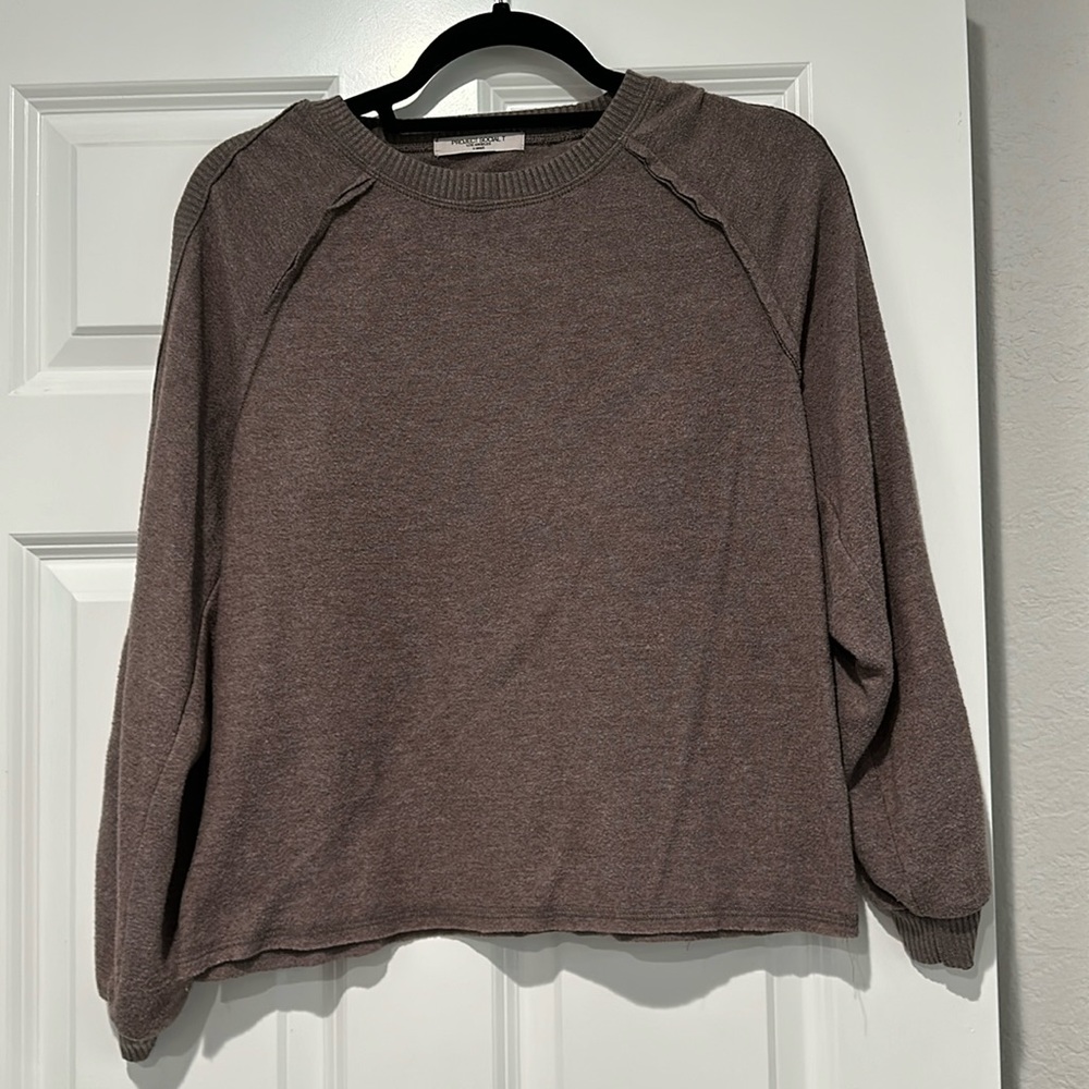 Cozy long sleeve lightweight top with cutouts on sleeves